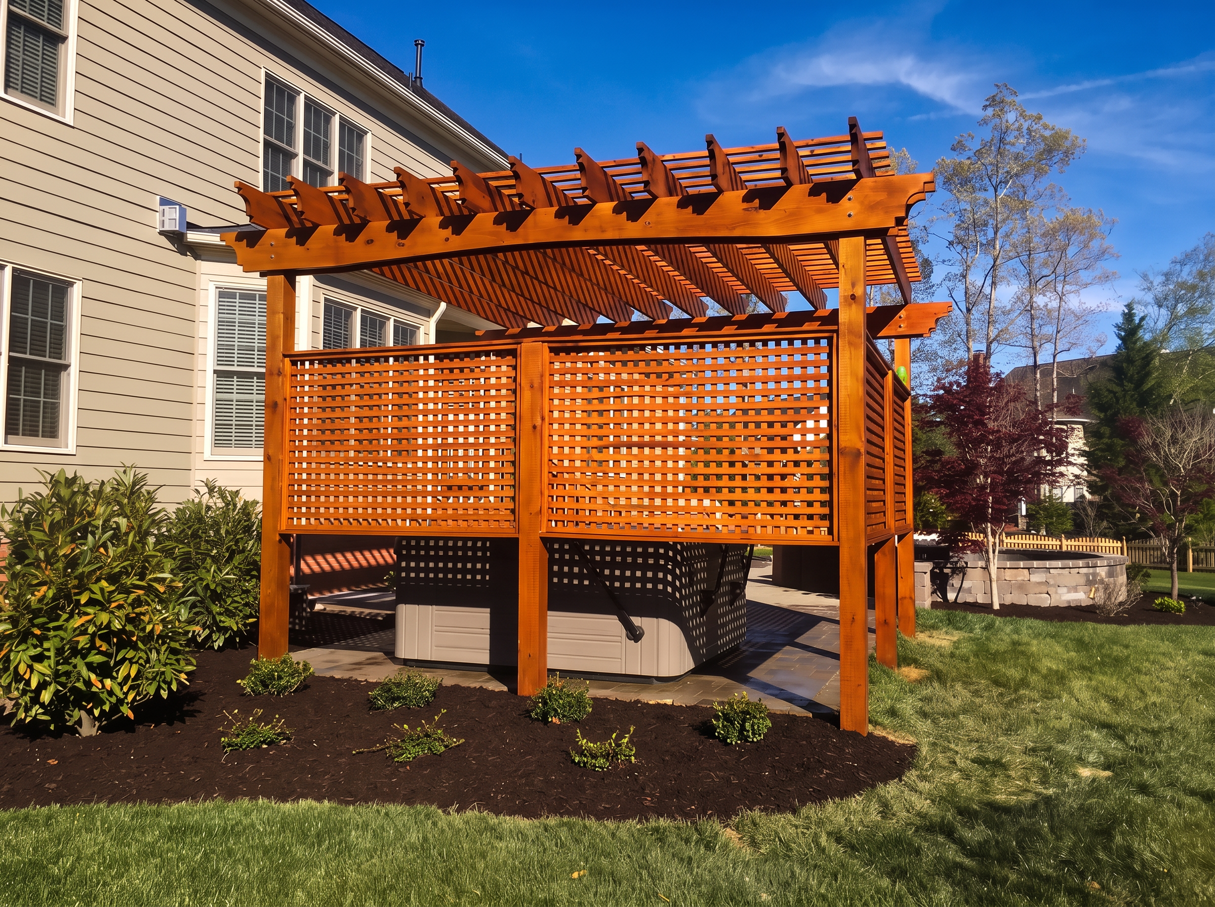 Stained wooden pergola with lattice privacy screen over a hot tub
